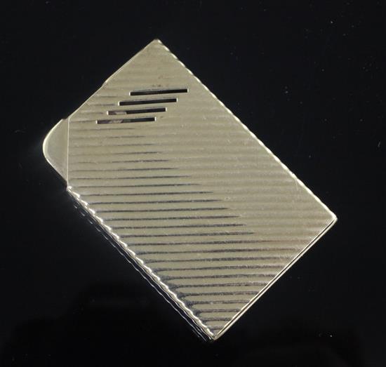 A Tiffany & Co ribbed 14ct gold lighter, 57mm.